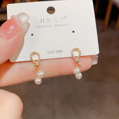 Серьги-гвоздики с круглыми подвесками и микропаве из прозрачных кубических цирконий в латунной оправе FS-WGC5F67-01-1