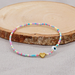 Браслеты-растяжки из стеклянных бусин макарон JJ3447