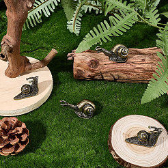 4 Stück 2 Stile Legierung Schnecke Display Dekorationen&nbsp;DJEW-SP0001-38