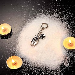 ペット骨壷キーホルダー 個性的足跡骨壷ペンダント ペット火葬ジュエリー ステンレス鋼の足跡 犬形見 猫犬骨壷 収納袋付き  ステンレス鋼色  7.5x1.6cm&nbsp;JX364A