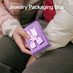 Rechteckige Geschenkboxen zur Aufbewahrung von Schmucksets aus Papier mit Schleife&nbsp;CON-TAC0014-12B
