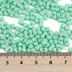 焼付塗装ガラスシードビーズ  丸い穴  ピーナッツ  アクアマリン  3.5x6x3.5mm  穴：0.9mm  約3750個/ポンド&nbsp;SEED-K010-A07