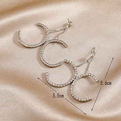 Латунные серьги-гвоздики с подвеской в виде буквы X.&nbsp;TH5434