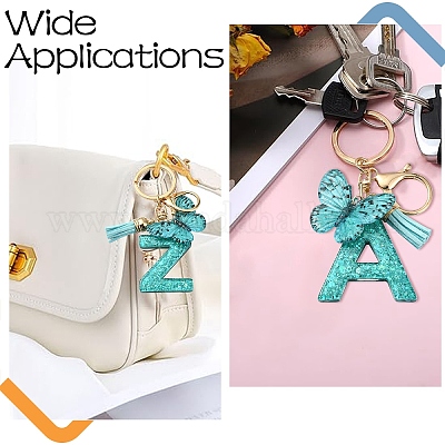 Брелок с кисточкой из смолы X1-KEYC-YW00119-01-1