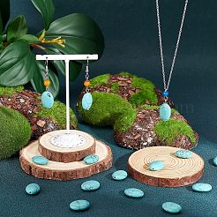 2 нити плоских овальных синтетических бирюзовых бусин TURQ-NB0001-10