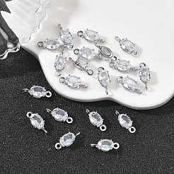 Charms conectores ovalados de latón pavé con circonitas cúbicas de Shegrace&nbsp;XGRQ2O873-437A-P