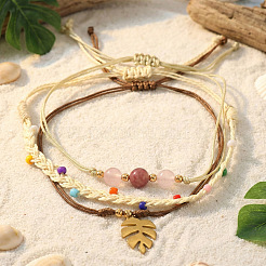 Set di 3 braccialetti in 3 stili diversi con perline rotonde di rodocrosite naturale&nbsp;DI3925-1