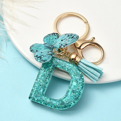 Брелок с кисточкой из смолы X1-KEYC-YW00119-04-1