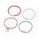 4 Stück 4 Stil Glasstretch-Armbänder mit Wort-Weihnachtsfreude-Acrylperlen BJEW-TA00126-4