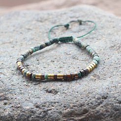Pulseras trenzadas ajustables con turquesa africana natural (jaspe) y cuentas heishi de ojo de tigre.&nbsp;WGCF761-01