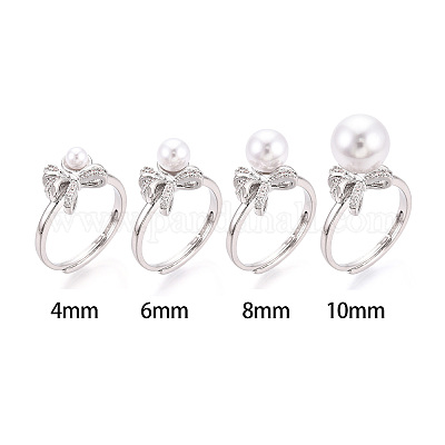 Закрепка колец для чашек с бантом из латуни с микропаве из кубического циркония KK-N274-25P-1