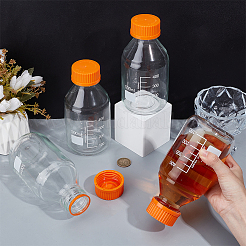 Botella de vidrio reutilizable con tapa de rosca de plástico de color naranja oscuro.&nbsp;CON-WH0112-031A