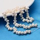 Grado de hebras de perlas de agua dulce cultivadas naturales A23W7011-2