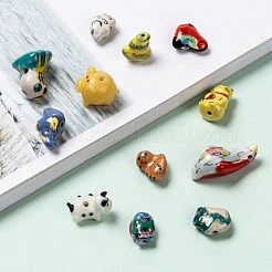 Perline fatti a mano in porcellana animale misto&nbsp;PORC-L027-03