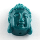 Perline di corallo tinto Buddha head sintetico CORA-R011-15C-1