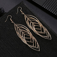 Boucles d'oreilles pendantes à pompon en laiton creux œil de cheval à la mode, or