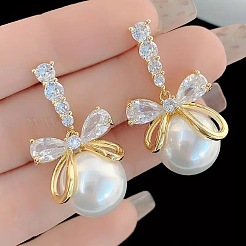 Серьги-гвоздики с бантом и круглыми прозрачными кубическими цирконами из сплава с микропаве&nbsp;FS-WG257E1-01