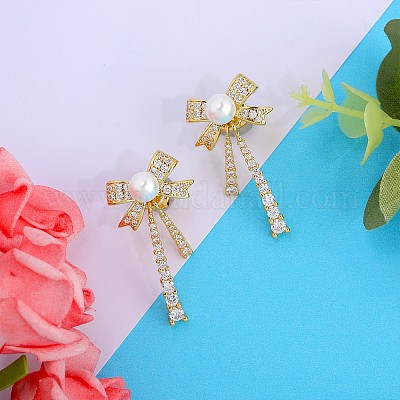 Серьги-гвоздики с подвесками и бантом из прозрачного циркония и бусинами из искусственного жемчуга JE1094A-1