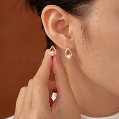 Серьги-гвоздики из латуни с каплевидным паве и прозрачным фианитом UK6514