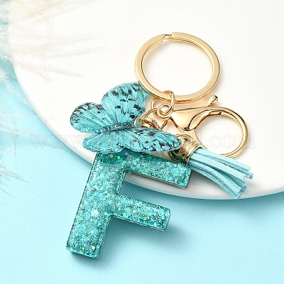 Брелок с кисточкой из смолы X1-KEYC-YW00119-06-1