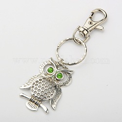 Tibetan Style Alloy Grade A Rhinestone Bird Keychain, with Alloy Swivel Lobster Claw Clasp and Iron Clasps, Owl, Platinum and Antique Silver, Peridot, 71mm