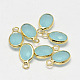 Oval Faceted Golden Tone Brass Glass Charms X-GLAA-O015-G-2