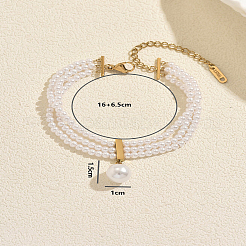 Pulseras multihilo con dije redondo de perla natural de agua dulce y cadena final de acero inoxidable.&nbsp;UK4868