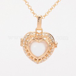 Golden Plated Brass Rhinestone Cage Pendants, Chime Ball Pendants, Hollow Heart, with No Hole Spray Painted Brass Round Ball Beads, White, 28x27x15mm, Hole: 3x8mm